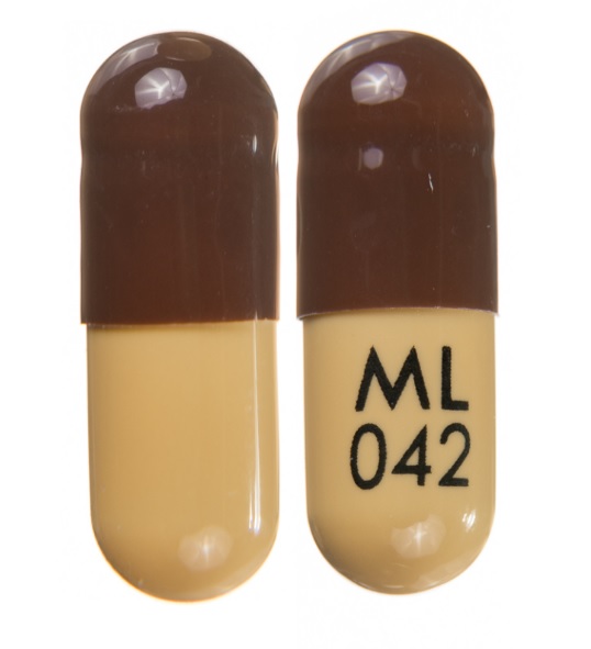 Pill ML042 Brown & Yellow Capsule/Oblong is Doxycycline Monohydrate