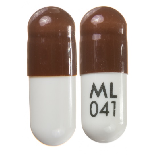 Pill ML041 Brown & White Capsule/Oblong is Doxycycline Monohydrate