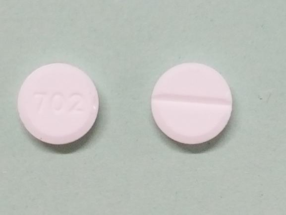 Pill 702 White Round is Dxevo