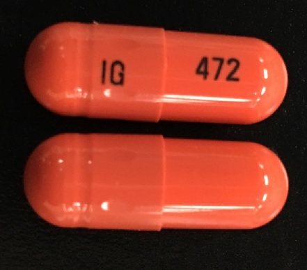 Pill IG 472 Orange Capsule/Oblong is Fenofibrate (Micronized)