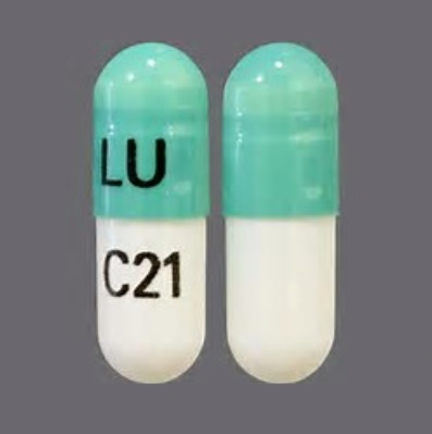 Pill LU C21 Green & White Capsule/Oblong is Fenofibrate (Micronized)