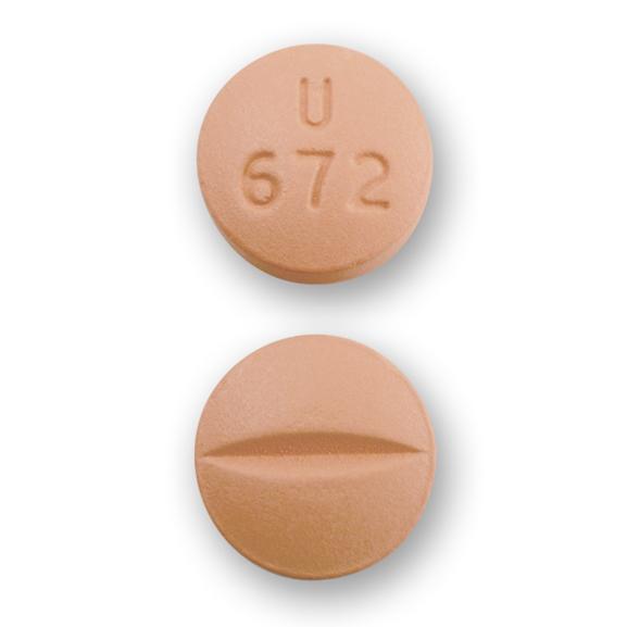 U 128 Pill Orange Round 7mm - Pill Identifier