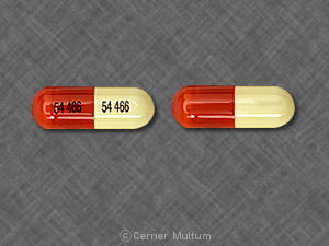 Pill 54 466 54 466 Orange & White Capsule/Oblong is Imipramine Pamoate