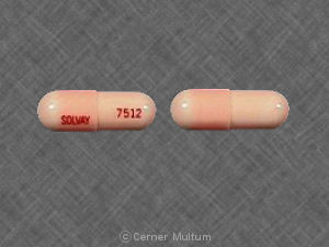 Pill SOLVAY 7512 Pink Capsule/Oblong is Lithonate