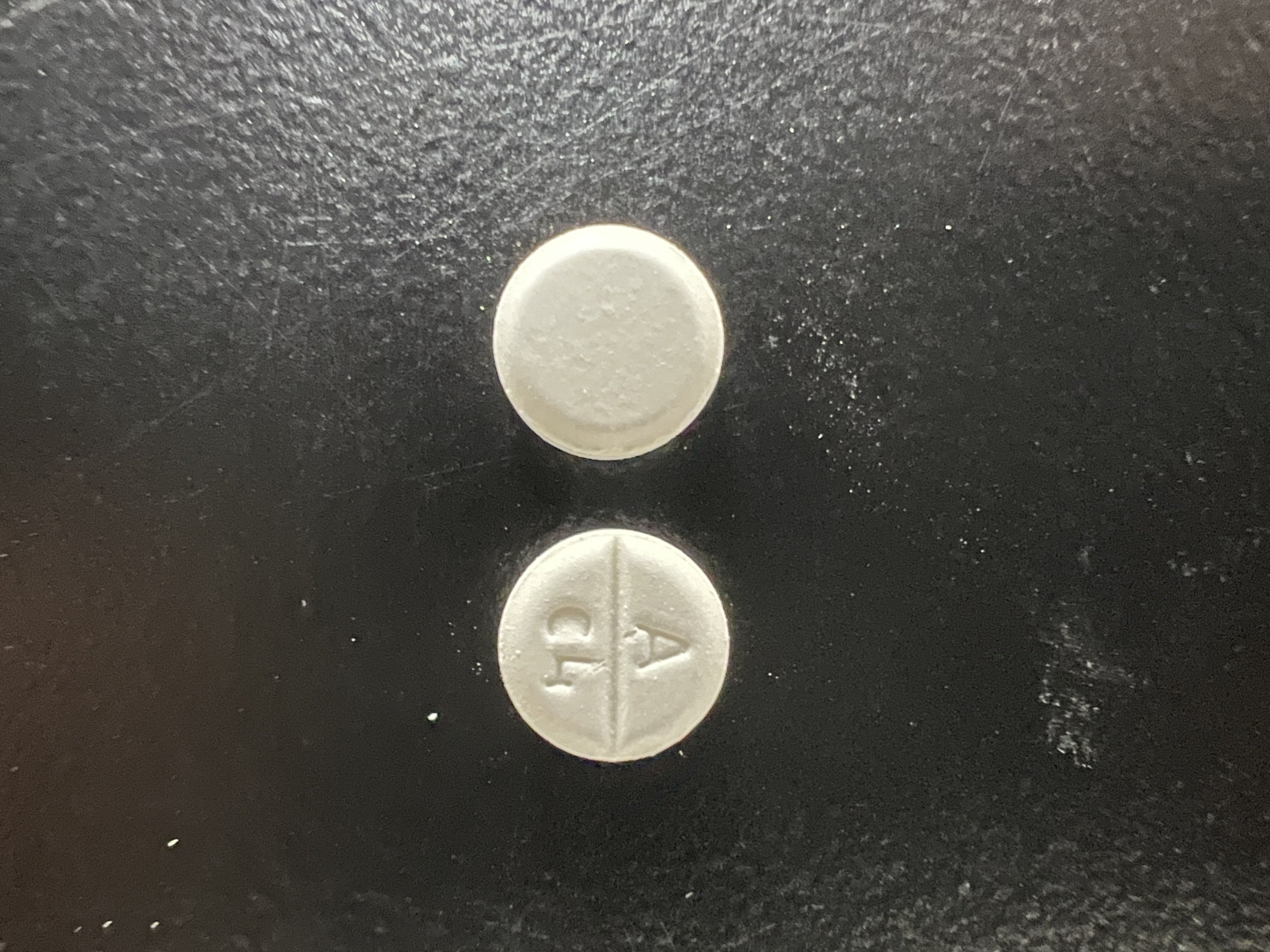 White Round Pill With L194 - rv17wqp