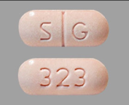 Pill S G 323 Pink Capsule/Oblong is Metaxalone