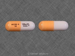 Pill MICRO-K 10 Ther-Rx 009 Orange & White Capsule/Oblong is Micro-K 10