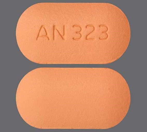 Pill AN 323 Peach Capsule-shape is Niacin Extended-Release