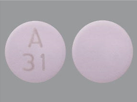 Pill A31 Purple Round is Oxybutynin Chloride Extended-Release