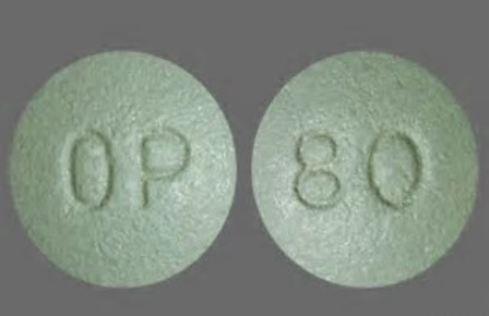 Pill OP 80 Green Round is Oxycodone Hydrochloride Extended-Release