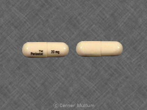 Pill TM Periostat 20 mg White Capsule-shape is Periostat