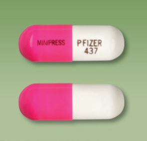 Pill MINIPRESS PFIZER 437 Pink & White Capsule/Oblong is Prazosin Hydrochloride