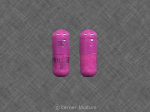 Pill 607 PRILOSEC 20 Purple Capsule/Oblong is Prilosec