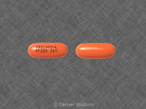 Pill PROCARDIA PFIZER 260 Orange Capsule-shape is Procardia