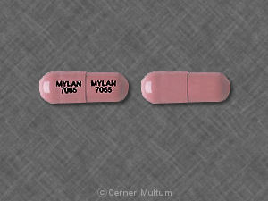 Pill MYLAN 7065 MYLAN 7065 Pink Capsule/Oblong is Propoxyphene Hydrochloride