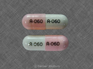 Pill A-060 A-060 Pink & White Capsule/Oblong is Ursodiol