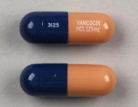 Pill 3125 VANCOCIN HCL 125mg Blue & Brown Capsule/Oblong is Vancomycin Hydrochloride