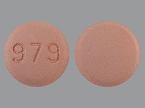Pill 979 Pink Round is Zolmitriptan
