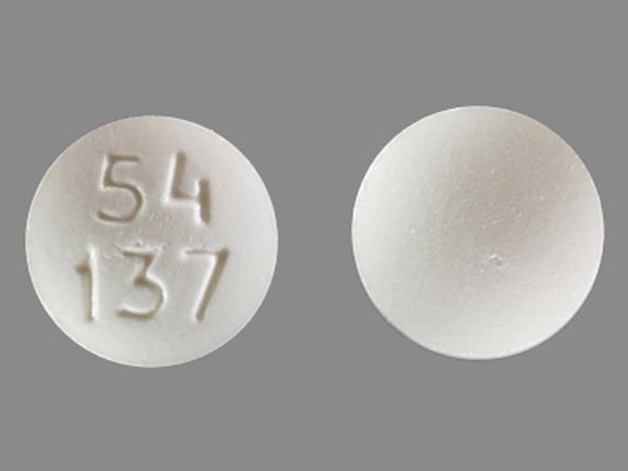 Pill 54 137 White Round is Quetiapine Fumarate