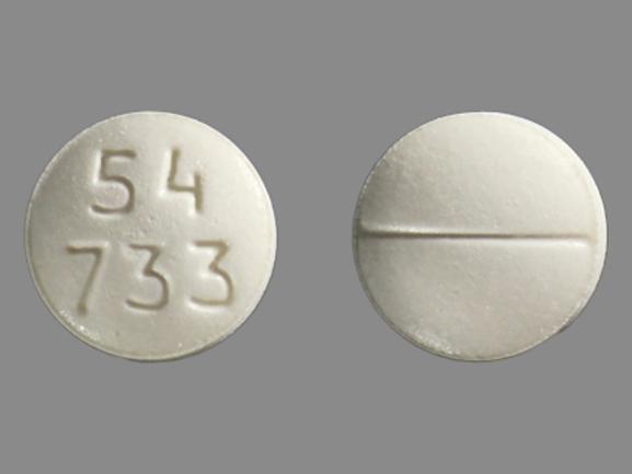 Pill 54 733 White Round is Morphine Sulfate