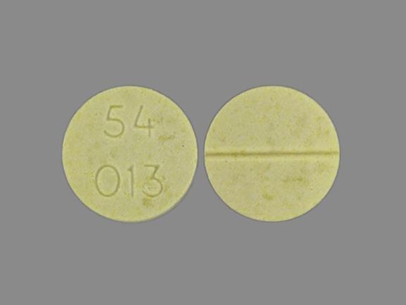 Pill 54 013 Yellow Round is Leucovorin Calcium