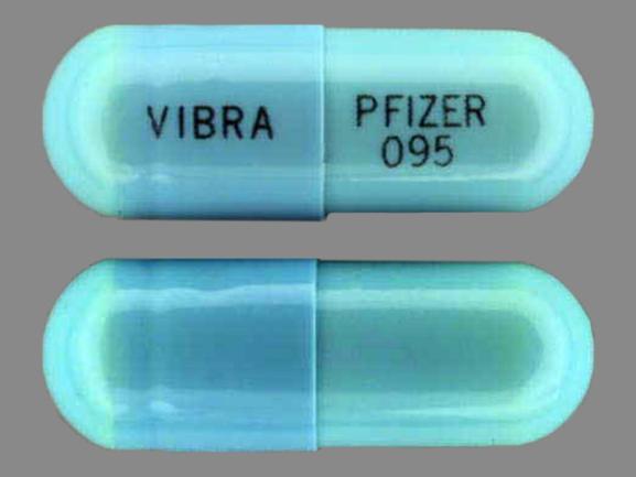 Pill VIBRA PFIZER 095 Blue Capsule/Oblong is Doxycycline Hyclate