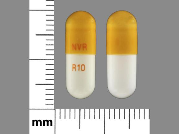 Pill NVR R10 Brown & White Capsule/Oblong is Methylphenidate Hydrochloride Extended-Release