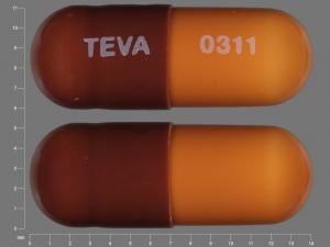 Pill TEVA 0311 Brown Capsule/Oblong is Loperamide Hydrochloride
