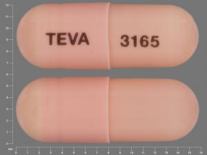 Pill TEVA 3165 Pink Capsule/Oblong is Minocycline Hydrochloride