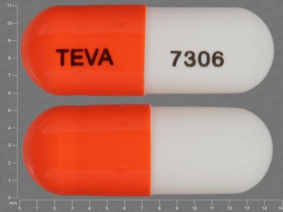 Pill TEVA 7306 Orange & White Capsule/Oblong is Celecoxib