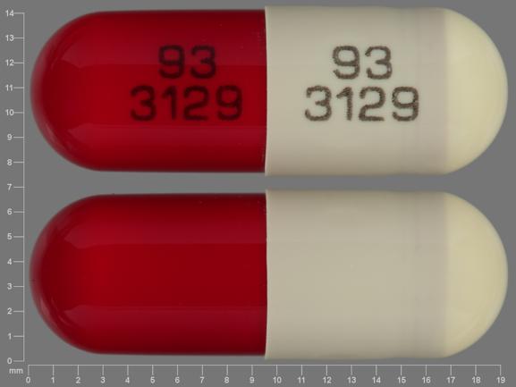 Pill 93 3129 93 3129 Beige & Red Capsule-shape is Disopyramide Phosphate