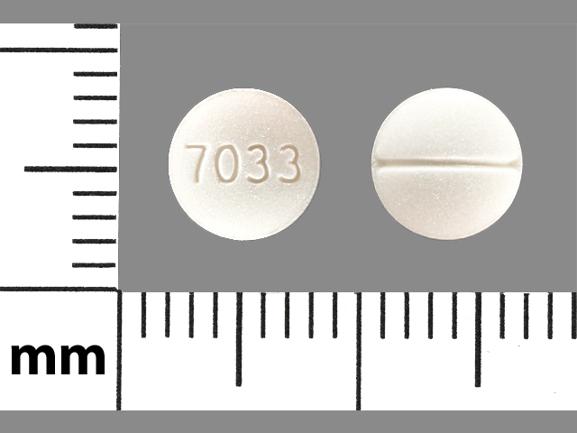 Pill 7033 is Fludrocortisone Acetate 0.1 mg