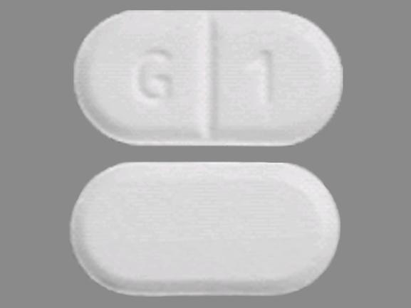 Pill G 1 White Capsule/Oblong is Glyburide (micronized)