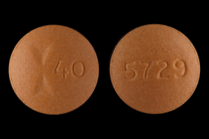 Pill Logo 40 5729 Tan Round is Famotidine