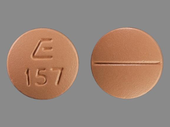 Pill E 157 Beige Round is Fluvoxamine Maleate