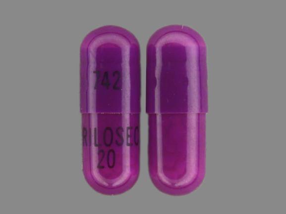 Pill 742 PRILOSEC 20 Purple Capsule/Oblong is Prilosec