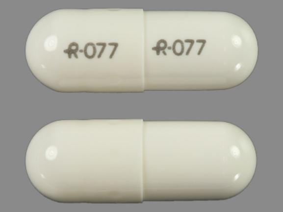 Pill R-077 R-077 White Capsule/Oblong is Temazepam