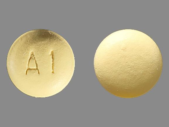 Pill A1 Yellow Round is Zolpidem Tartrate Extended Release