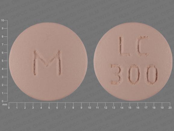 Pill M LC 300 Peach Round is Lithium Carbonate Extended Release