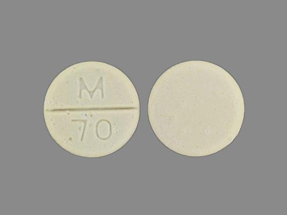 Pill M 70 White Round is Clorazepate Dipotassium