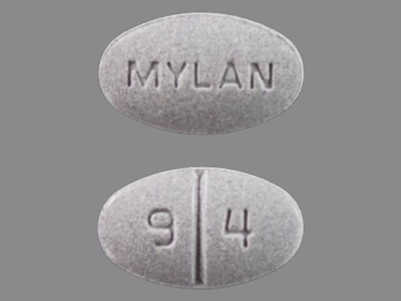 Pill MYLAN 9 4 Purple Oval is Carbidopa and Levodopa Extended Release