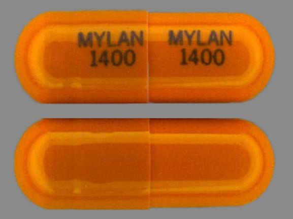 Pill MYLAN 1400 MYLAN 1400 Orange Capsule/Oblong is Acebutolol Hydrochloride