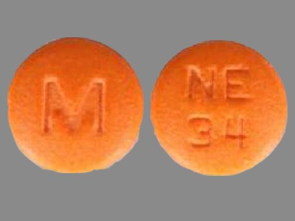 Pill M NE 34 Orange Round is Nisoldipine Extended Release