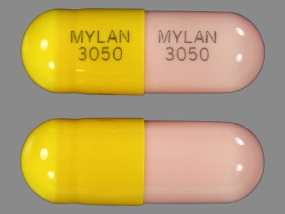 Pill MYLAN 3050 MYLAN 3050 Pink & Yellow Capsule-shape is Clomipramine ...