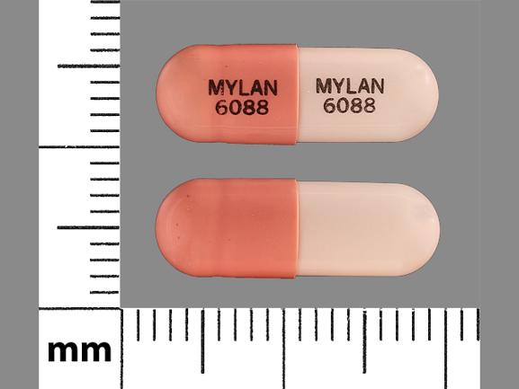Pill MYLAN 6088 MYLAN 6088 Pink Capsule/Oblong is Fenofibrate (Micronized)
