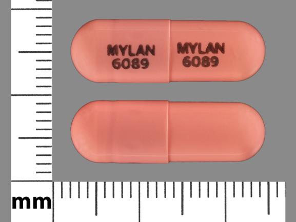 Pill MYLAN 6089 MYLAN 6089 Pink Capsule/Oblong is Fenofibrate (Micronized)