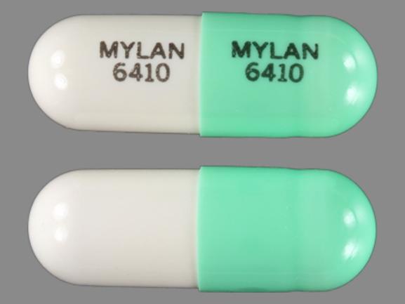 Pill MYLAN 6410 MYLAN 6410 Green & White Capsule-shape is Doxepin Hydrochloride