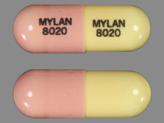 Pill MYLAN 8020 MYLAN 8020 Pink & White Capsule-shape is Fluvastatin Sodium