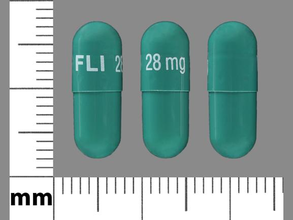 Pill FLI 28 mg Green Capsule-shape is Namenda XR