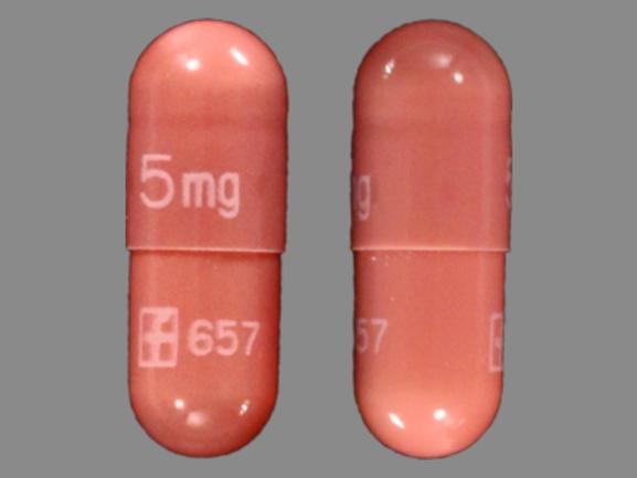 Pill 5mg LOGO 657 Red Capsule/Oblong is Prograf